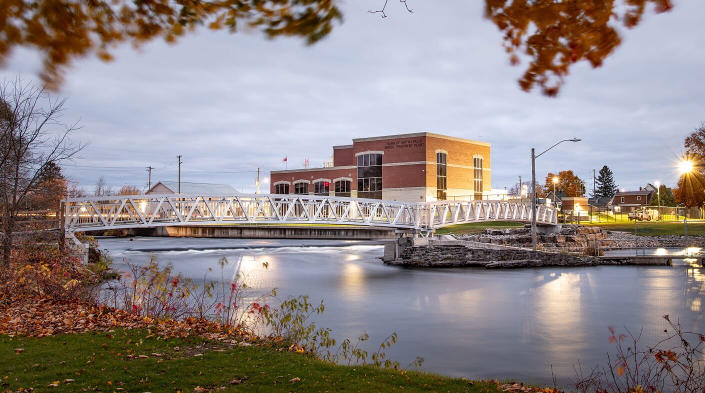 Aluminum pedestrian bridge over river